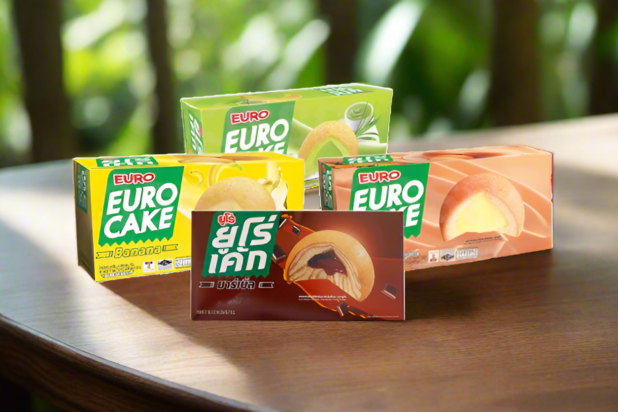 Four boxes of Euro Cake on a white background