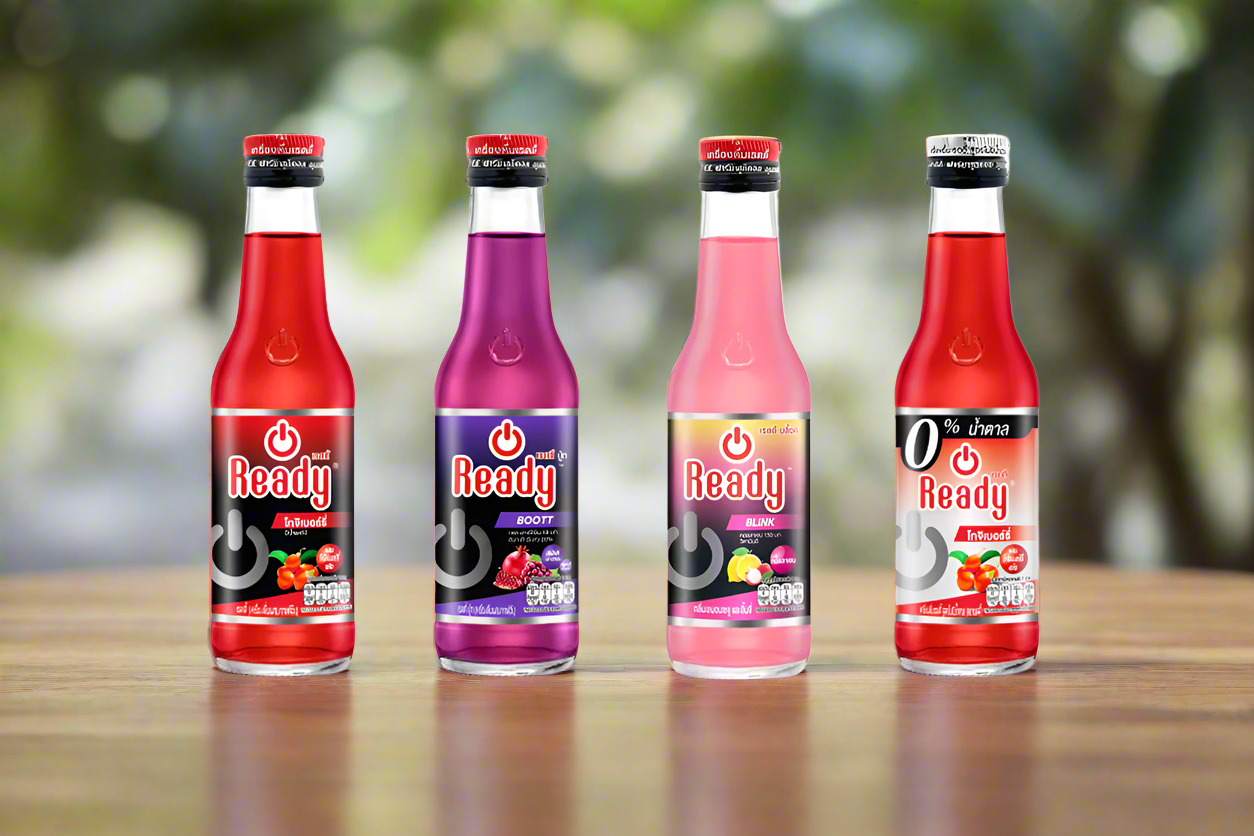 Four bottles of 'Ready' drinks in different flavors on a white background